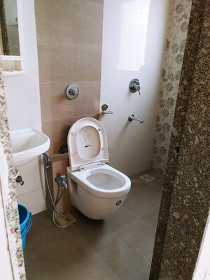 Bathroom in 3 BHK Apartment at Axis Paradigm Whistling Meadows, Paud Road – for Rent