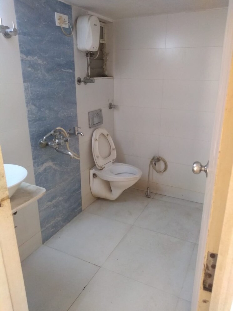 Bathroom, unique-poonam-estate-cluster-2 2 Bedroom 689 Sq.Ft. Apartment In Mira Road Thane 9310361