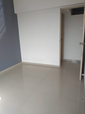 Room in 2 BHK Apartment at Unique Poonam Estate Cluster 2, Mira Road – for Sale