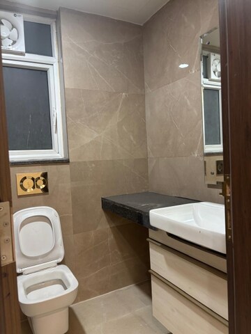 Bathroom in 3 BHK Apartment at Smart World Orchard, Sector 61 – for Rent