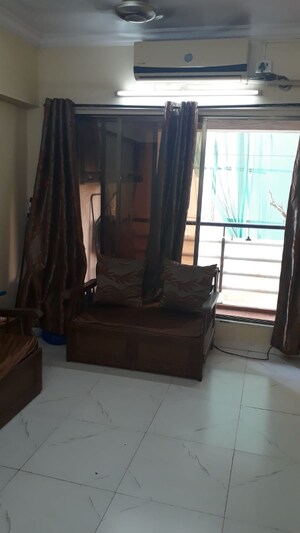 Living Room in 2 BHK Apartment at Virgo Heights, Bandra West – for Rent