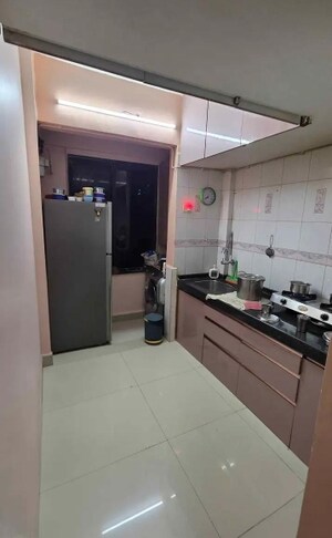 Kitchen in 1 BHK Apartment at Lodha Park CHS, Bhayandar East – for Sale