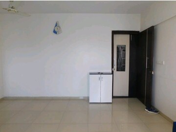 Room in 2 BHK Apartment at Vraj Green Valley, Kolshet Industrial Area – for Rent