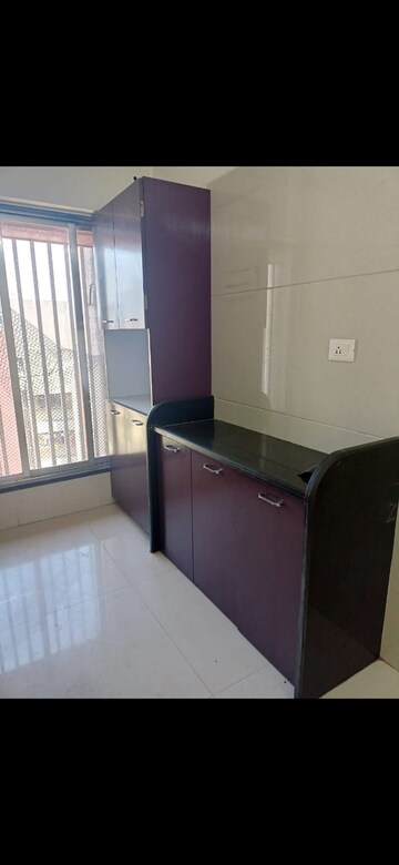 Kitchen in 3 BHK Apartment at Unique Poonam Estate Cluster 3, Mira Road – for Rent