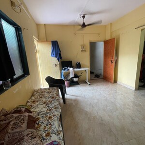 Living Room in 1 BHK Apartment at Kopar Khairane Sector 19 – for Rent