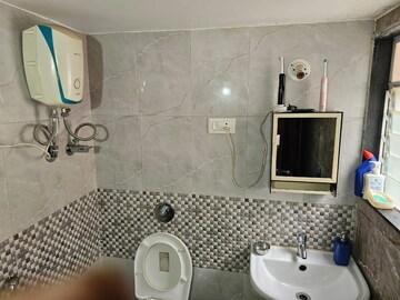 Bathroom in 3 BHK Apartment at SSD Goregaon Pearl CHSL, Goregaon West – for Rent