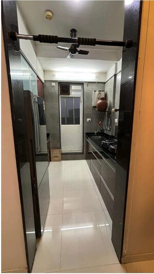 Kitchen in 2 BHK Apartment at Lodha Luxuria Priva, Majiwada – for Sale