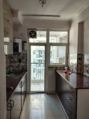 Kitchen in 3 BHK Apartment at Amrapali Leisure Park, Amrapali Leisure Valley – for Rent