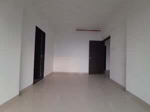 Room in 2 BHK Apartment at Gulmohar CHS Goregaon, Goregaon West – for Rent