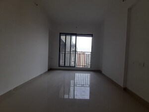 Room in 2 BHK Apartment at Gulmohar CHS Goregaon, Goregaon West – for Rent