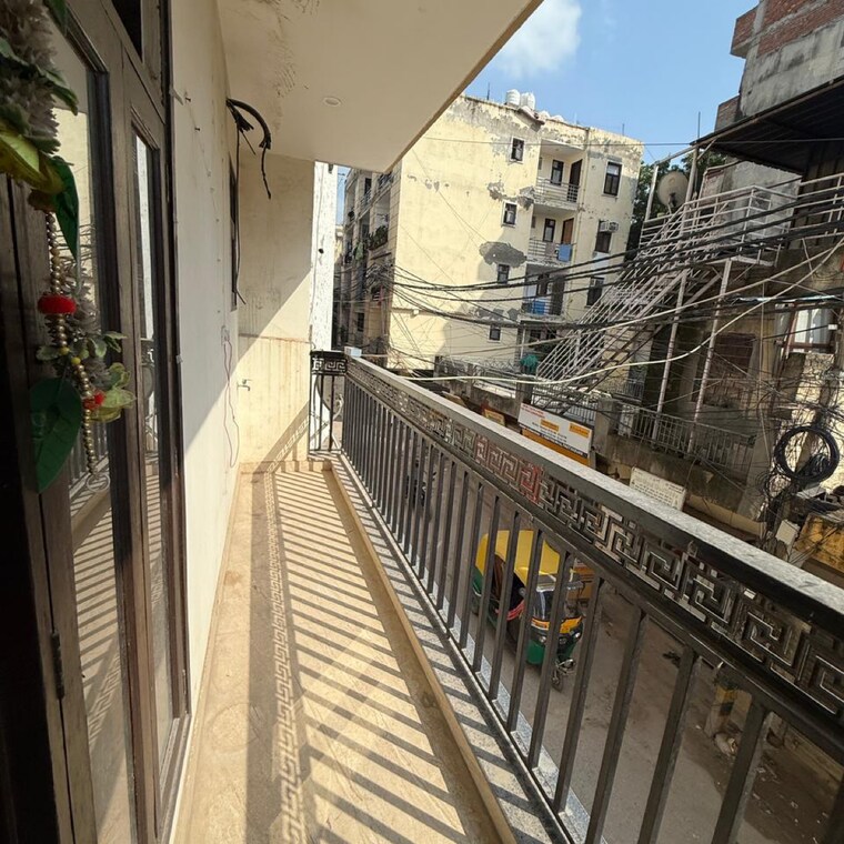 Balcony, palm-residency-chhatarpur 2 Bedroom 900 Sq.Ft. Apartment In Rajpur Khurd Extension Delhi 9311083