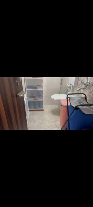 Bathroom in 1 BHK Apartment at Dharti Presidio, Malad West – for Rent