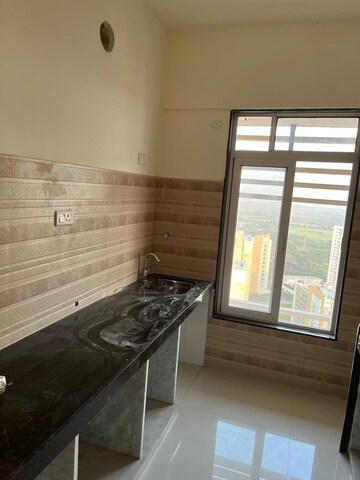 Kitchen in 1.5 BHK Apartment at Sheth Avante, Kanjurmarg West – for Rent