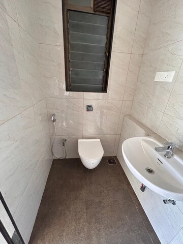 Bathroom in 2 BHK Apartment at Chandak 34 Park Estate, Goregaon West – for Rent