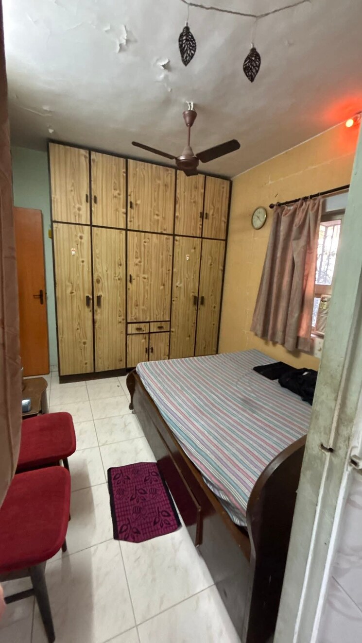 Bedroom, goregaon west Pg For Boys In Goregaon West 9311146