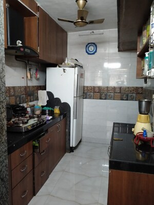 Kitchen in 3 BHK Apartment at Karan Palace CHS, Kopar Khairane – for Rent