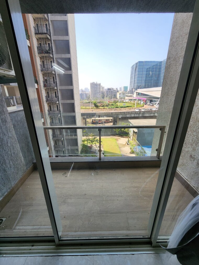 Balcony, l-t-seawoods-residences-phase-1-part-a 2 Bedroom 825 Sq.Ft. Apartment In Seawoods Navi Mumbai 9311246
