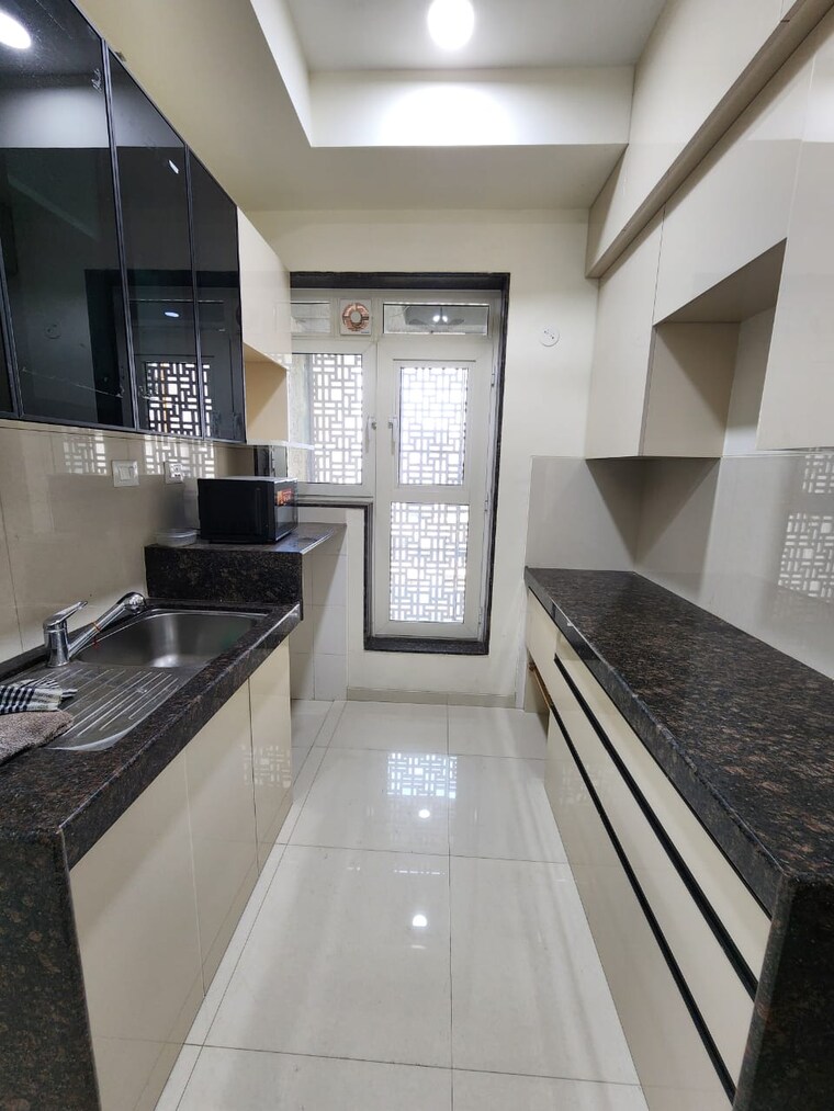 Kitchen, l-t-seawoods-residences-phase-1-part-a 2 Bedroom 825 Sq.Ft. Apartment In Seawoods Navi Mumbai 9311246