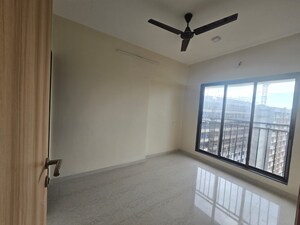 Room in 2 BHK Apartment at Pratham ARC Aura, Andheri West – for Rent