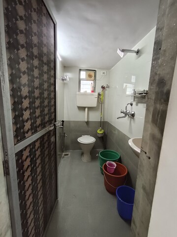 Bathroom in 1 RK Apartment at Shaheed Bhagat Singh CHS, Andheri East – for Rent