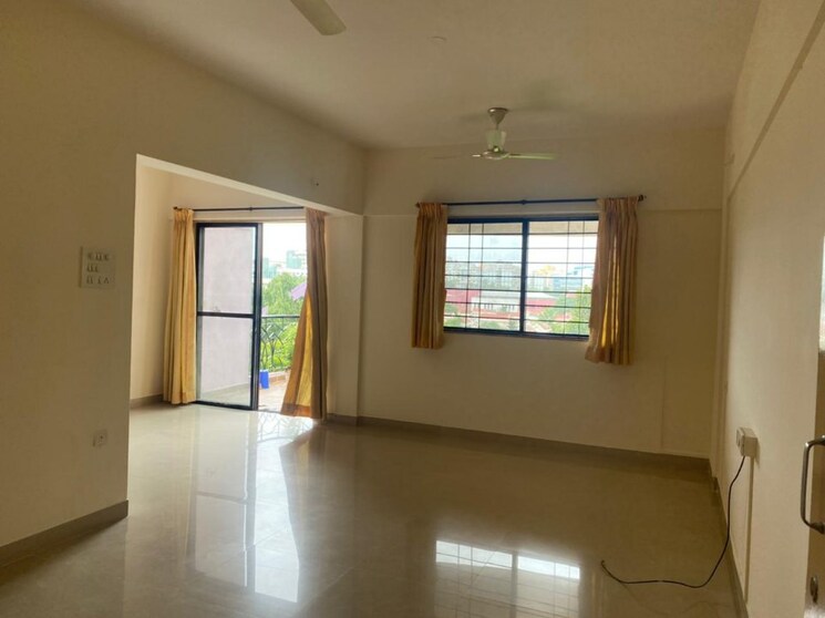 Living Room, magarpatta-city-cosmos 2 Bedroom 980 Sq.Ft. Apartment In Magarpatta Road Pune 9311361