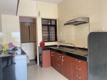 Kitchen in 2 BHK Apartment at Magarpatta City Cosmos, Magarpatta Road – for Rent