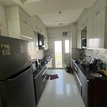 Kitchen in 3 BHK Apartment at Samridhi Grand Avenue, Ecotech 12 Greater Noida – for Rent