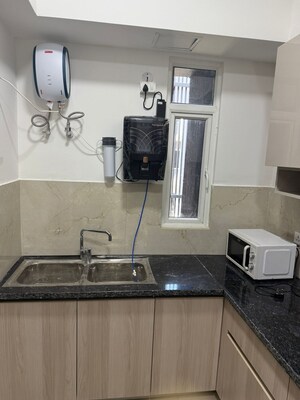 Kitchen in 3 BHK Apartment at Smart World Orchard, Sector 61 – for Rent