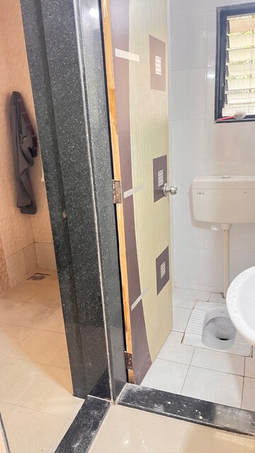 Bathroom in 2 BHK Apartment at Empire Shree Swami Samarth, Bibwewadi – for Rent