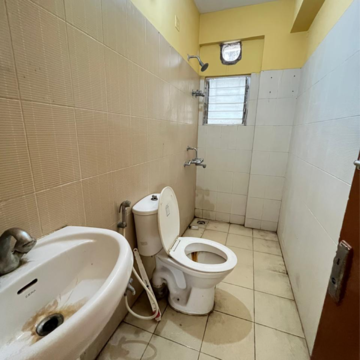Bathroom in 2 BHK Apartment at Mukul Shanti Garden, Bablatala – for Sale