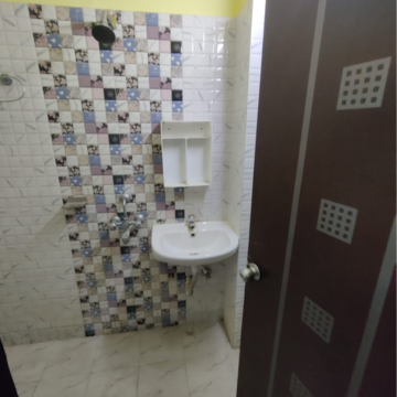 Bathroom in 3 BHK Apartment at Dream Residency Manor, Salua – for Rent