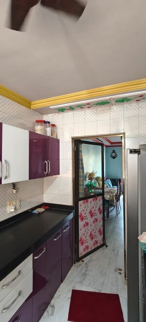 Kitchen in 2 BHK Apartment at Vashi Parshvadham CHS, Vashi Sector 28 – for Sale