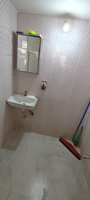 Bathroom in 2 BHK Apartment at Vashi Parshvadham CHS, Vashi Sector 28 – for Sale