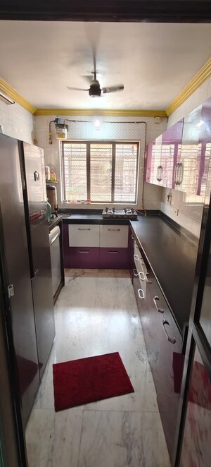 Kitchen in 2 BHK Apartment at Vashi Parshvadham CHS, Vashi Sector 28 – for Sale