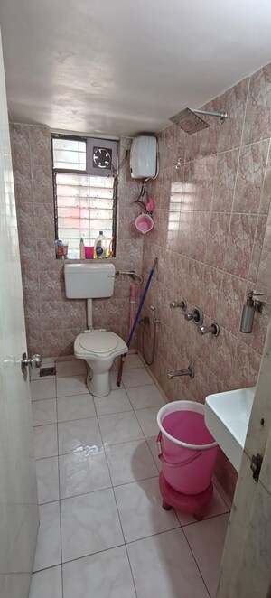 Bathroom in 2 BHK Apartment at Vashi Parshvadham CHS, Vashi Sector 28 – for Sale