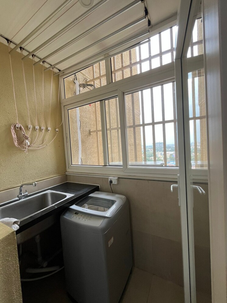 Kitchen, bhartiya-nikoo-homes 2.5 Bedroom 1288 Sq.Ft. Apartment In Thanisandra Main Road Bangalore 9311608