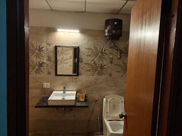 Bathroom in 1 RK Builder Floor at Supertech Czar Suites, Omicron I Greater Noida – for Rent