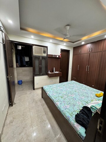 Bedroom in 2 BHK Builder Floor at Kalkaji – for Rent