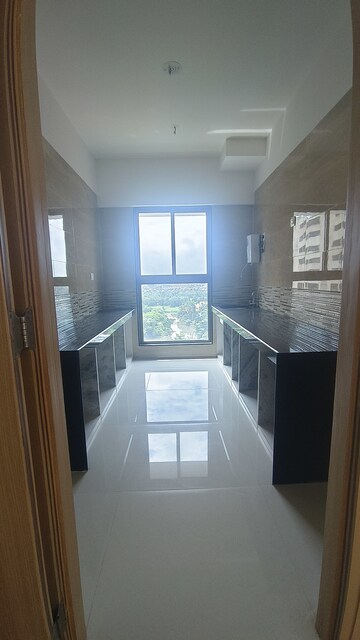 Kitchen in 2 BHK Apartment at Rajesh Raj Infinia, Malad West – for Rent