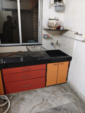 Kitchen in 2 BHK Apartment at Sunrise Apartment Mahim, Mahim – for Rent