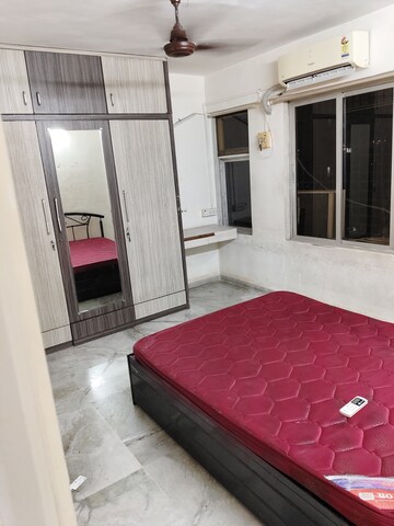 Bedroom in 2 BHK Apartment at Sunrise Apartment Mahim, Mahim – for Rent