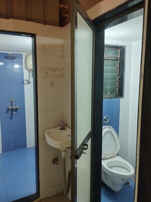 Bathroom in 1 BHK Apartment at Nilgiri Tower Agripada, Agripada – for Rent