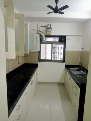 Kitchen in 2 BHK Apartment at Godrej Emerald, Ghodbunder Road – for Rent