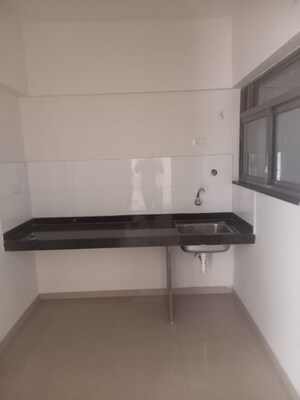 Kitchen in 2 BHK Apartment at Skyi Star City, Dhayari – for Sale