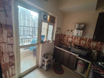 Kitchen in 2 BHK Apartment at Nimbus The Hyde park, Sector 78 – for Rent