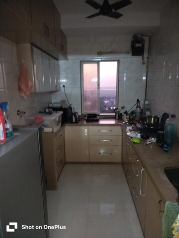 Kitchen in 2 BHK Apartment at Dharti Pressidio, Kandivali West – for Rent