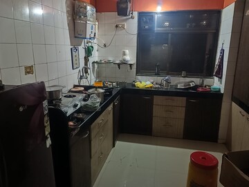 Kitchen in 2 BHK Apartment at Shree Tirupati Siddeshwar Gardens Villa, Dhokali – for Sale