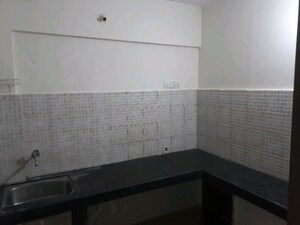 Kitchen in 1 BHK Apartment at Jalan Aura County Pune, Wagholi – for Sale