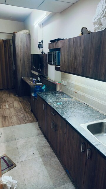 Kitchen in 1 BHK Apartment at Paramount Golfforeste, Zeta I Greater Noida – for Rent