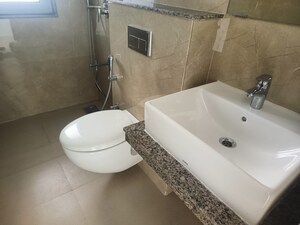 Bathroom in 1 BHK Apartment at Omkar Signet, Malad East – for Rent